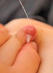 Preggo freak toying pussy and sprays breast milk